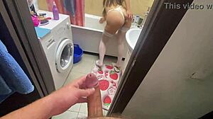 Jerking off to my stepmom in the bathroom, feeling intense arousal.