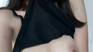 Want to see this beautiful manekizinha showing her natural big tits?