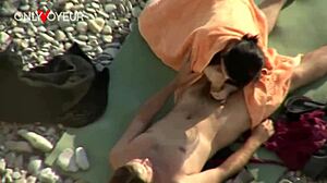 beach voyeur watches brunette riding cock doggystyle