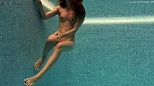 Irina russaka shows off underwater in tight outfit