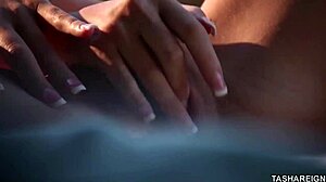 Tasha Reign's hot poses reveal her juicy pussy and big tits.