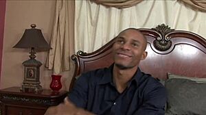 Morgan Ray, the cougar in lingerie, gets fucked doggystyle by a muscular bodybuilder on the bed.