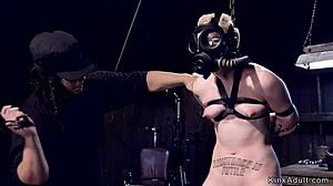 Tormented Blonde Slave In Gas Mask