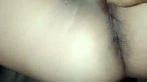 Young amateur bent over in doggy style close-up.