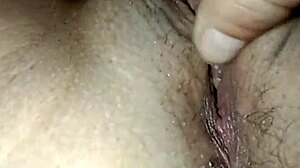 Young amateur bent over in doggy style close-up.