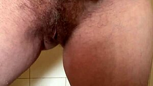 He loves to play with my hairy pussy