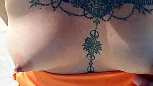 Look at her tits and ass on the beach!