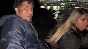 my wife giving it to another on the beach sand