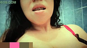 She's very horny and goes to bathroom to masturbate, squirting first time