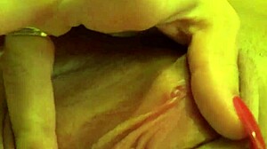 Look at this tanned petite with conical tits in close-up