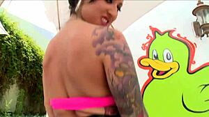 Tattooed slut moans as ass gets torn in hardcore anal.