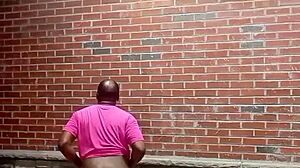 A private strip tease for free while faced backwards in 70 degree weather