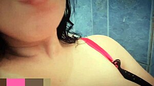 She's very horny and goes to bathroom to masturbate, squirting first time