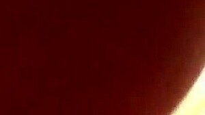 Look at this tanned petite with conical tits in close-up