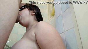 The busty wife deepthroats her daddy's thick cock in the bathroom.