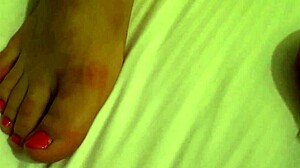 Look at this tanned petite with conical tits in close-up