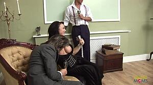 Hot brunette MILF shares two fat cocks