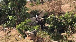 a quick outdoor encounter by the riverside