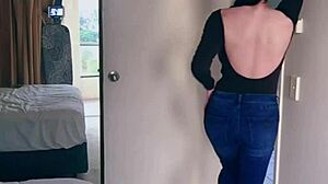 Pretty Asian Ladyboy strips jeans, showing gifted big boobs