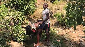 a quick outdoor encounter by the riverside