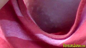 Can you believe the voyeur peeping at these Asian babes' side boobs?