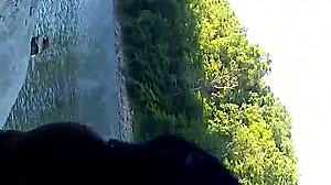 Interracial blowjob turns to doggystyle in public outdoor fun!