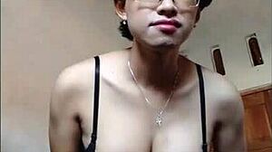 Young shemale masturbates big cock