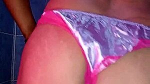 Mexican model dances in satin bra and panties.