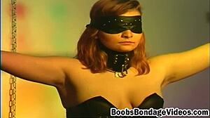 Pale redhead bound by master in BDSM