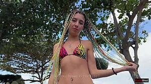 Rastafarian woman enjoys a special cigarette and desires intimacy