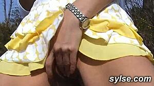 Milf enjoys beach time with voyeurs