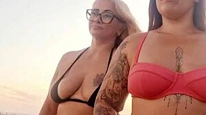 feeling excited talking dirty on beach with slutty friend, then deflowering young guy.