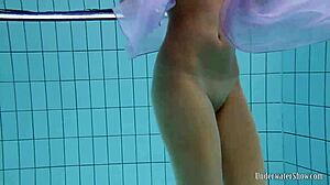 Aneta Shows Big Tits In Purple Dress Underwater In Pool