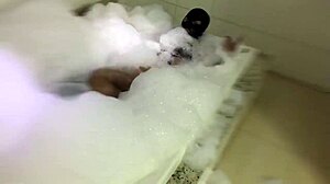 The brunette feels sensual in the bathtub, showing her big pussy.
