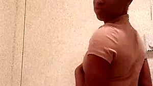 Black girl shows her chocolate ass in the bathroom