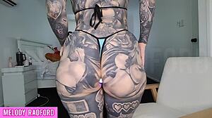 milf tries on micro bikini with vibrating anal butt plug