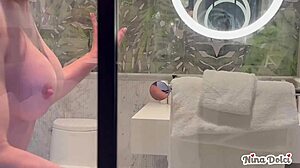 MILF Busts Bellboy Stroking