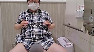 Woman Masturbates in Toilet