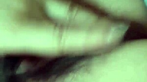 Chinese milf masturbates