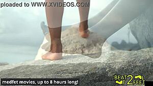 feet rubbing hot rock?